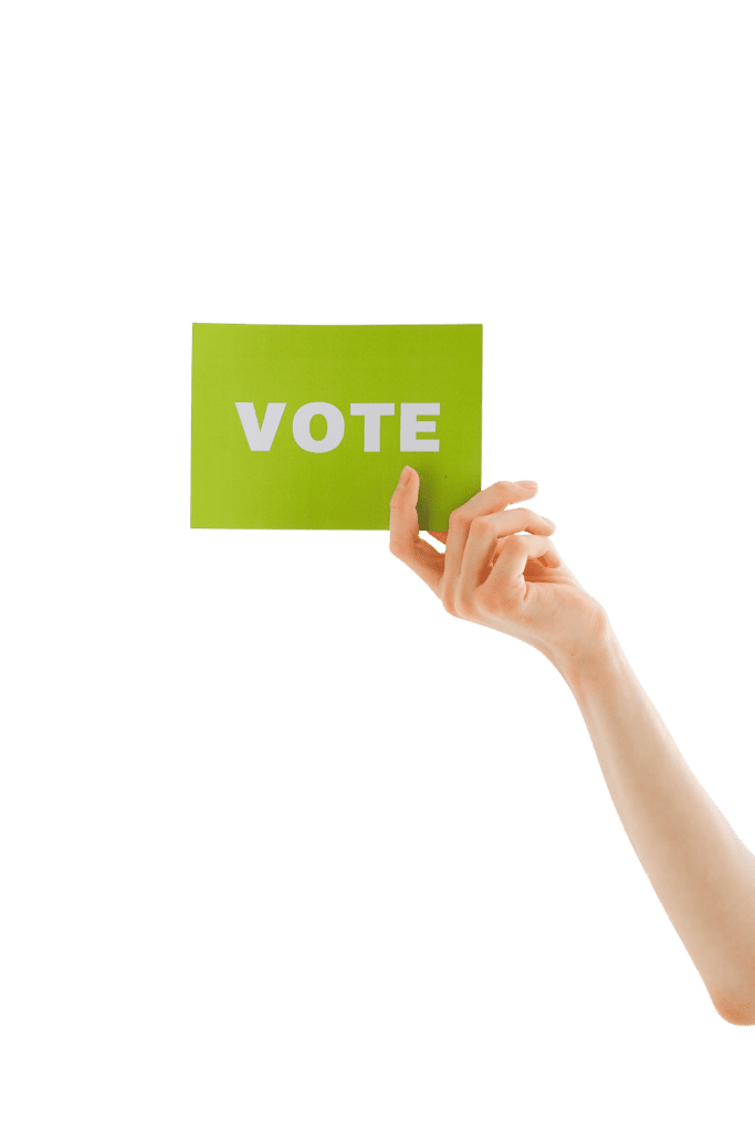 Enjoying RVing, traveling, camping, nature with a hand holding a green vote sign.