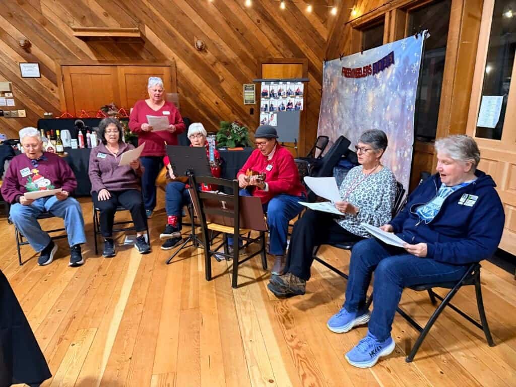 Enjoying RVing, traveling, camping, nature with a group of women in a cozy wooden cabin.